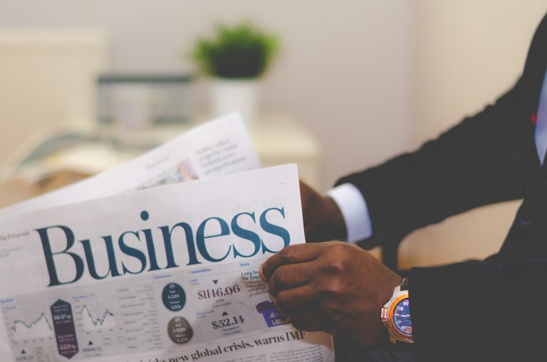 Business articles in newspaper